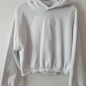 Zara white cropped hoodie sweatshirt in size large.